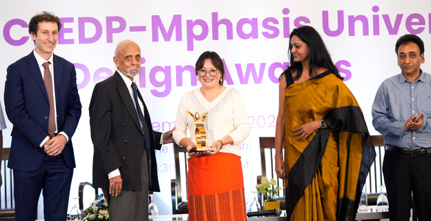 Kopele Tepa receiving the NCPEDP-Mphasis Universal Design Award 2023