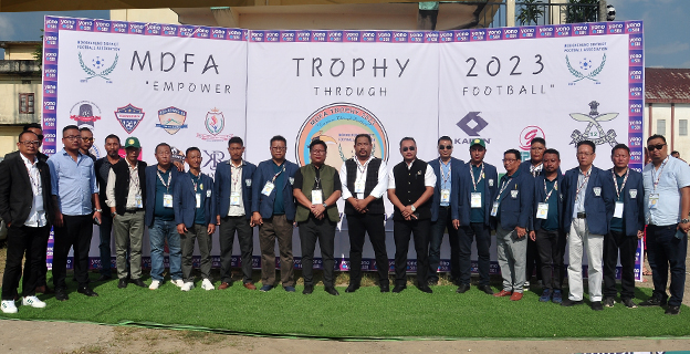 MLA and General Secretary of Nagaland Football Association (NFA), Benei Lamthiu with officials of MDFA and Organizing Committee of MDFA Trophy 2023 at Imkongmeren Sports Complex, Mokokchung, 17 October. (MTNews photo)