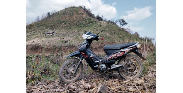 Canda motorbike parked at a jhum field at Pathso village under Noklak District