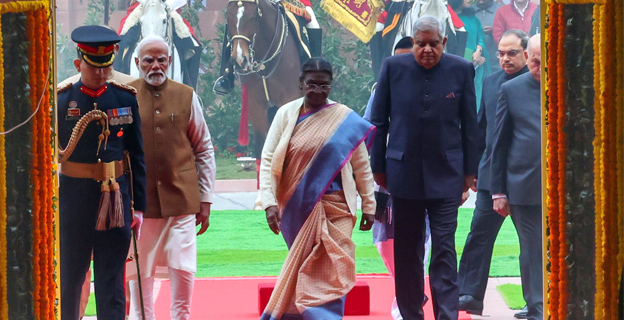 President Droupadi Murmu arriving at the Parliament flanked by PM Narendra Modi and Vice President Jagdeep Dhankhar