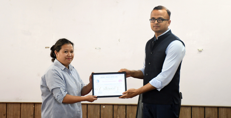 Tobacco free school certificate is being presented to Government Middle School Naga Bazaar by DC Kohima Kumar Ramnikant at DC's Conference Hall Kohima on 5th August 2024.