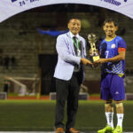 Niuland captain Kakhevi Assumi receives the Player of the Tournament award from NFA president K. Neibou Sekhose at the Dr T Ao Trophy 2025.