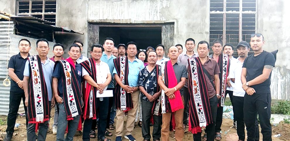 Members of Chungtia Village Council and Chungtia Students’ Union in front of the under-construction AYUSH Hospital at Sabangya, Mokokchung, during a verification visit on Monday, September 1.