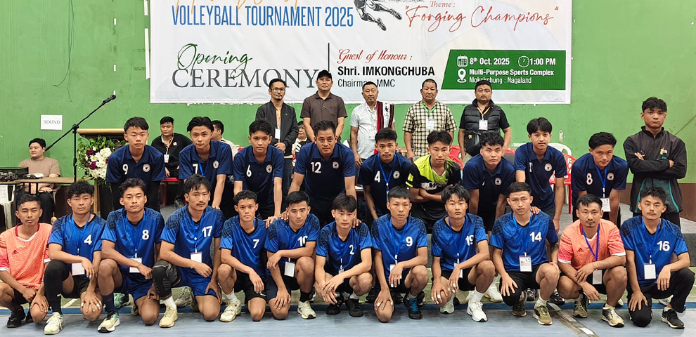 Players of the opening match between Kichutip and Penli Ward with guests and officials during the opening ceremony of the 4th Mokokchung Inter-Ward Volleyball Tournament at the Multi-purpose Sports Complex, Mokokchung, on October 8.