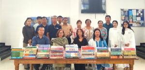 DGC economics faculty donate books to strengthen library resources